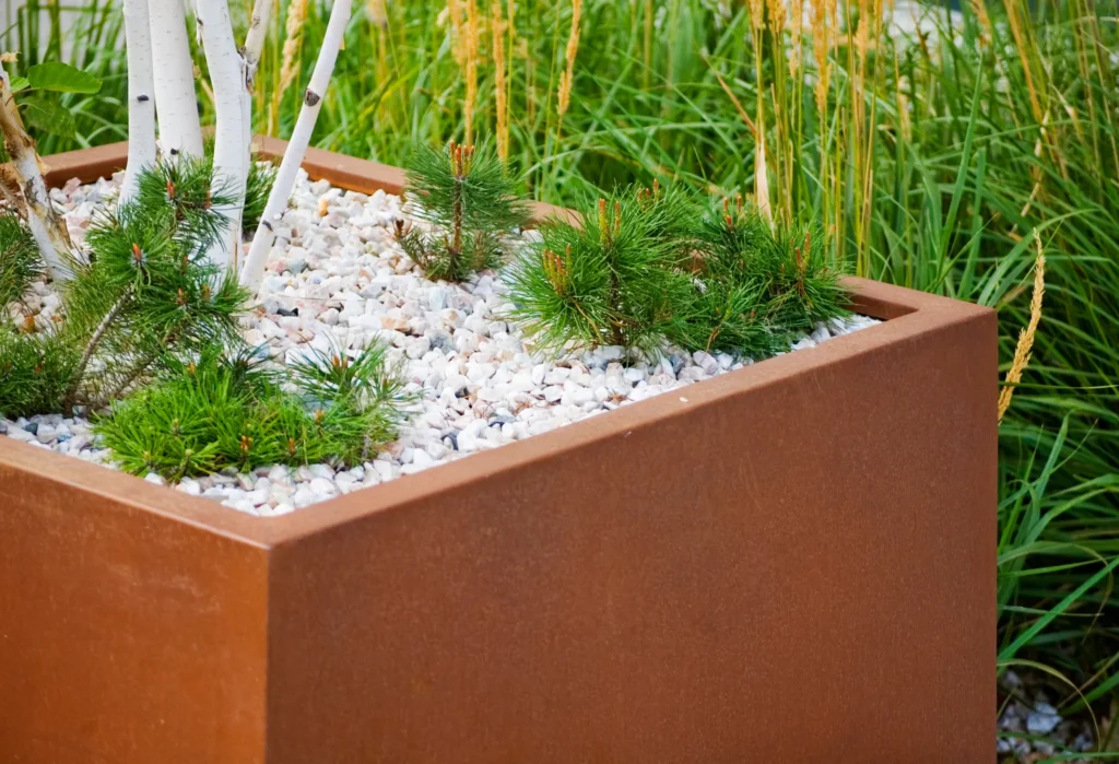 Cortenstalen maatwerk | Cortenstalen plantenbak | Cortenstaal in de tuin | Cortenstaal Vlaeminck | Cortenstaal Blankenberge